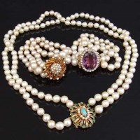 Lot 279 - Double strand pearl necklace; two three-stand