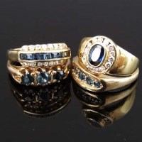 Lot 284 - Three 9ct sapphire rings, and an 18ct diamond and