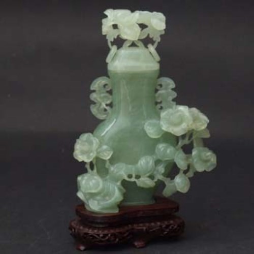 Lot 403 Green jade vase and cover, 20th century.
