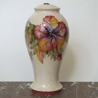 Lot 559 - Moorcroft Hibiscus lamp base.