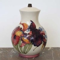 Lot 560 - Moorcroft orchid lamp base.