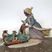 Lot 602 - Lladro figure of a girl and sleigh, DB 3500