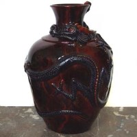 Lot 615 - Royal Doulton Dragon vase DB 3203