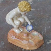 Lot 655 - Royal Doulton figure of A Little Boy, (hairline cracks) DB 4061