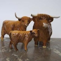 Lot 664 - Beswick Highland cow set