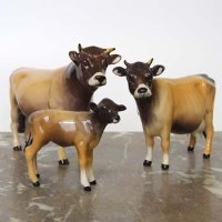 Lot 666 - Beswick Jersey cow set