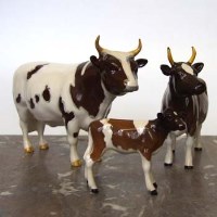 Lot 667 - Beswick Ayrshire cow set