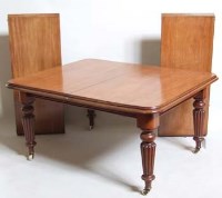 Lot 689 - Victorian mahogany wind-out dining table with two