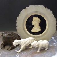 Lot 168 - Two ivory animals, toad, alabaster dish.