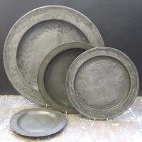Lot 185 - Two Pewter Plates and a Charger