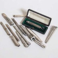 Lot 220 - Group of thirteen silver and metal pencils