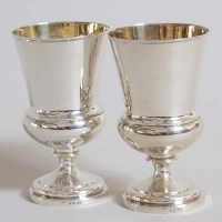 Lot 229 - Pair of silver thistle shaped goblets.