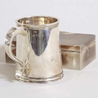 Lot 231 - Silver presentation mug and a silver cigarette