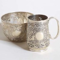 Lot 236 - Victorian embossed silver mug and an embossed