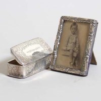 Lot 252 - Silver tobacco box and a photo frame (2).