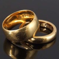 Lot 301 - Two 22ct gold plain band rings, 14.4g in total