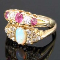 Lot 308 - 18ct gold opal cabochon and diamond cluster ring