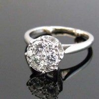 Lot 321 - Six stone cluster ring in 18ct white gold