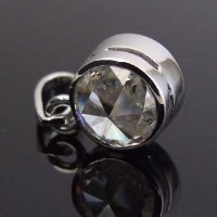 Lot 324 - 18ct gold reversible pendant set with a rosecut