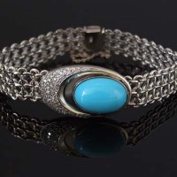 Lot 345 - 18ct white gold diamond and turquoise bracelet