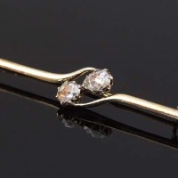 Lot 357 - Yellow gold bar brooch set with two rose-cut