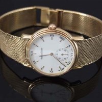 Lot 380 - Jaeger LeCoultre gold wristwatch