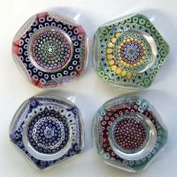 Lot 527 - Four Whitefriars paperweights   cut with circular