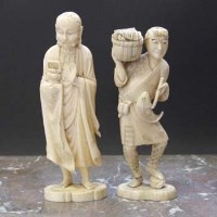 Lot 551 - Two ivory Okimonos.