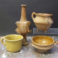 Lot 555 - Two 17th century Pipkin, Portugal, mug and costrel.