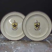 Lot 571 - Two Armorial cream ware plates.