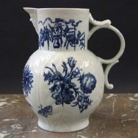 Lot 585 - Worcester cabbage moulded mask jug circa 1770