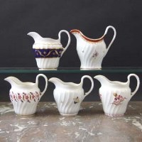Lot 666 - Five Flight Worcester and Barr jugs circa 1790 