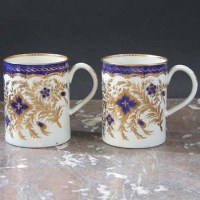 Lot 669 - Two Flight Worcester mugs circa 1790   painted