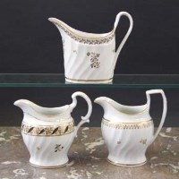 Lot 781 - Three Chamberlains Worcester cream jugs circa