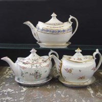 Lot 811 - Three Grainger Worcester teapots and stands circa