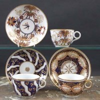 Lot 860 - Three Newhall cups and saucers circa 1800   one