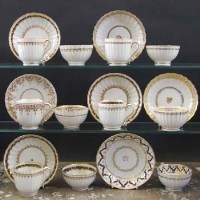 Lot 882 - Four Newhall trios, two teabowls and saucers and