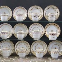 Lot 885 - Twelve Newhall cups and saucers circa 1800   with
