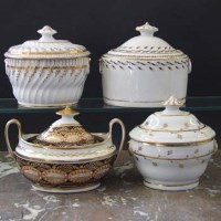 Lot 912 - Four Newhall sucriers circa 1800 - 1810   painted