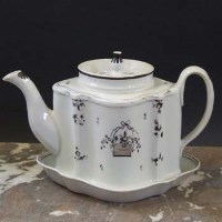 Lot 915 - Newhall teapot and associated stand circa 1790