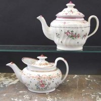 Lot 922 - Two Newhall teapots circa 1790   painted with