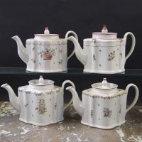 Lot 924 - Four Newhall teapots circa 1790,   painted with
