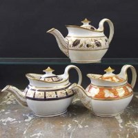 Lot 927 - Three Newhall teapots circa 1800   painted with