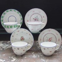 Lot 938 - Three Liverpool Herculaneum cups and saucers circa 1800