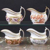 Lot 953 - Four Spode helmet shaped cream boats circa 1810