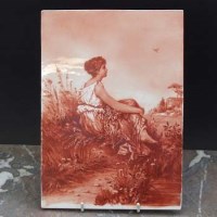 Lot 983 - Unmarked plaque painted in terracotta with a lady