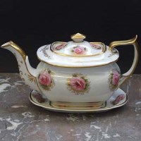 Lot 994 - Charles Bourne teapot and stand.