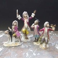 Lot 998 - Four monkey bandsmen.