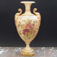 Lot 1050 - Royal Worcester twin handled vase.