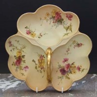 Lot 1055 - Royal Worcester tri form dish.